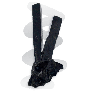 Aegirine is a glassy mineral that forms elongated pillar-shaped crystals with pointed terminations. Translucent to opaque, it is most often black but can vary from greenish-black or brownish-black.